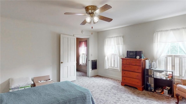 5 E Washington St, Bath, NY 14810 - bedroom with carpet flooring, baseboards, multiple windows, and heating unit