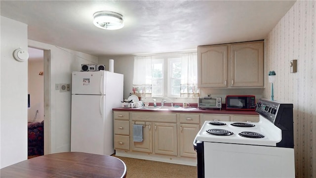 5 E Washington St, Bath, NY 14810 - kitchen with a sink, freestanding refrigerator, electric stove, black microwave, and wallpapered walls