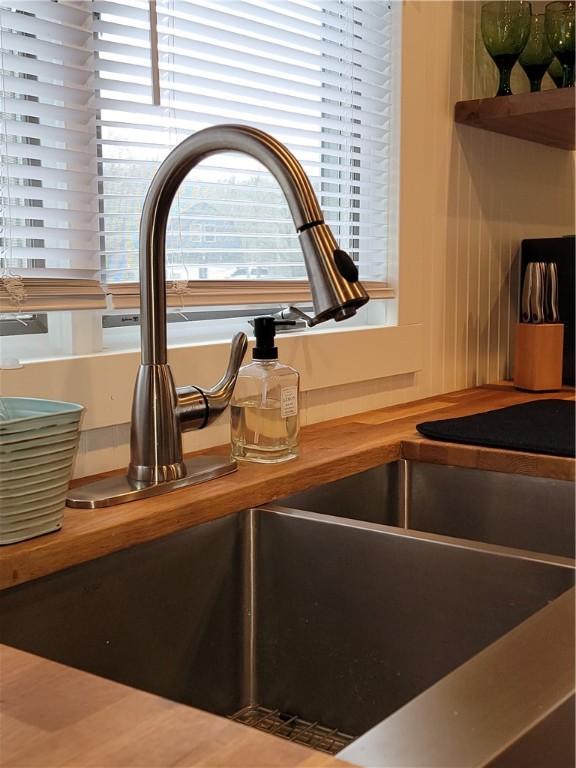 204 Ives Settlement Rd, Guilford, NY 13780 - room details featuring butcher block counters and a sink