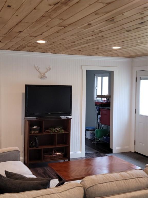 204 Ives Settlement Rd, Guilford, NY 13780 - living room with crown molding, baseboards, and wooden ceiling