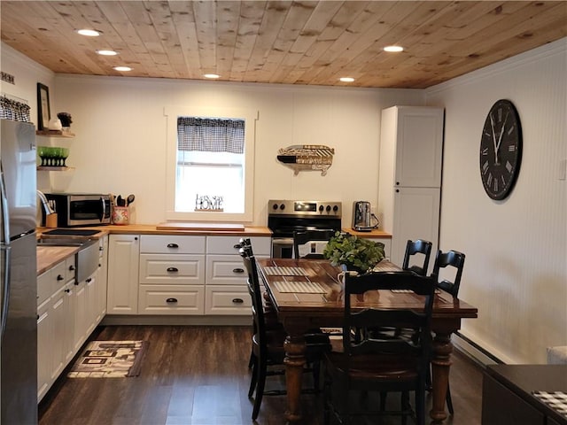 204 Ives Settlement Rd, Guilford, NY 13780 - dining area with dark wood-type flooring, recessed lighting, wooden ceiling, and crown molding