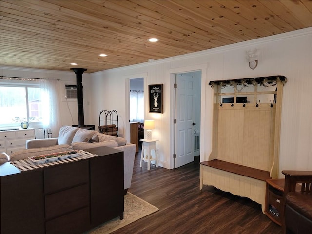 204 Ives Settlement Rd, Guilford, NY 13780 - bedroom with crown molding, wooden ceiling, a wood stove, dark wood-style flooring, and an AC wall unit