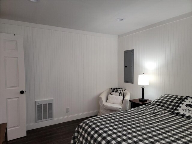 204 Ives Settlement Rd, Guilford, NY 13780 - bedroom featuring electric panel, baseboards, dark wood-style floors, and visible vents