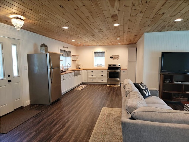 204 Ives Settlement Rd, Guilford, NY 13780 - living area with dark wood-type flooring, healthy amount of natural light, recessed lighting, ornamental molding, and wooden ceiling
