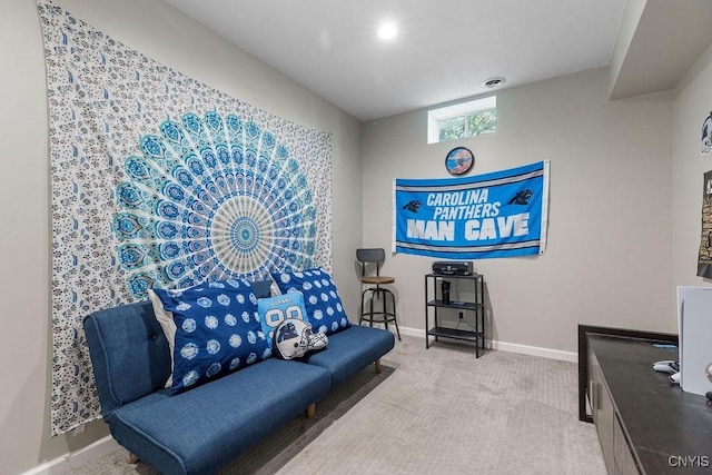 living area featuring visible vents, baseboards, and carpet flooring