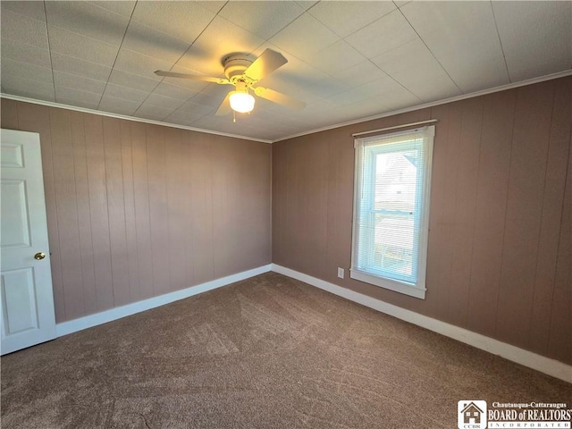 216 S Pleasant St, Shinglehouse, PA 16748 - spare room featuring crown molding, ceiling fan, baseboards, and carpet floors
