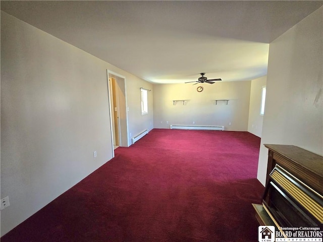 216 S Pleasant St, Shinglehouse, PA 16748 - unfurnished living room featuring a fireplace, a ceiling fan, carpet floors, a baseboard heating unit, and a baseboard radiator