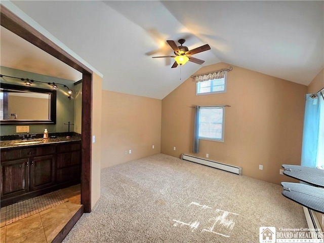 216 S Pleasant St, Shinglehouse, PA 16748 - bonus room featuring ceiling fan, light colored carpet, baseboard heating, a sink, and lofted ceiling