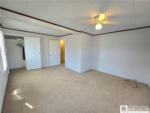 216 S Pleasant St, Shinglehouse, PA 16748 - unfurnished bedroom featuring carpet flooring, a closet, crown molding, and ceiling fan