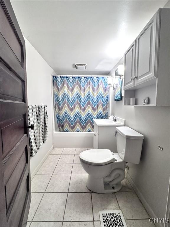 bathroom featuring baseboards, shower / bath combo, tile patterned floors, toilet, and visible vents