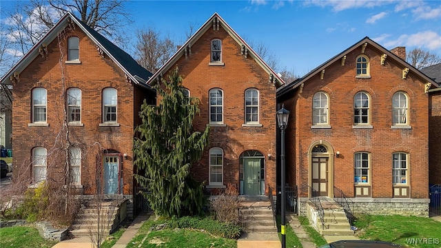 153 Allen St, Buffalo, NY 14201 - view of front of house featuring brick siding