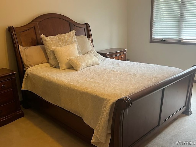 bedroom with light carpet