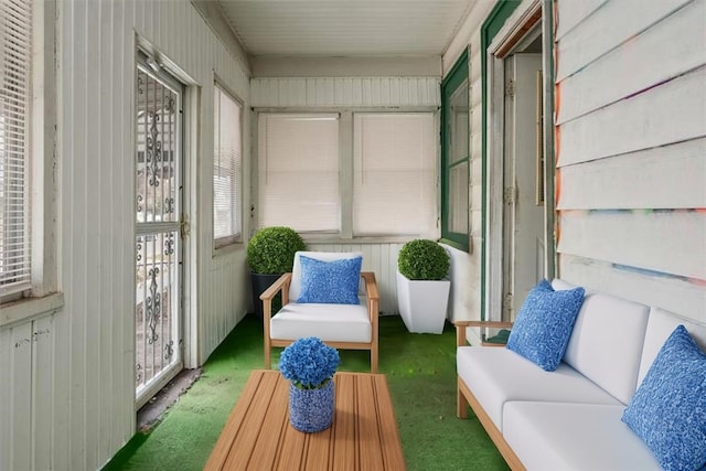 sunroom with outdoor lounge area