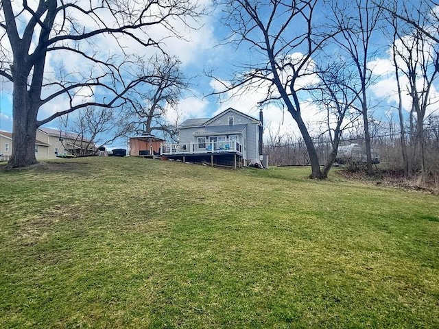 view of yard featuring a deck