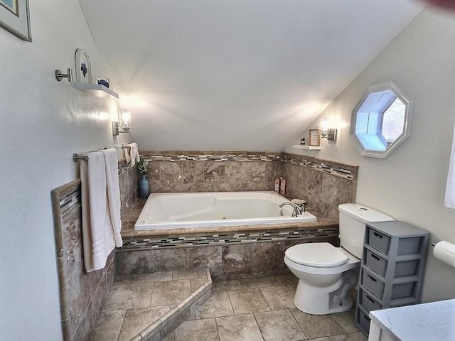 full bath featuring toilet and a bath