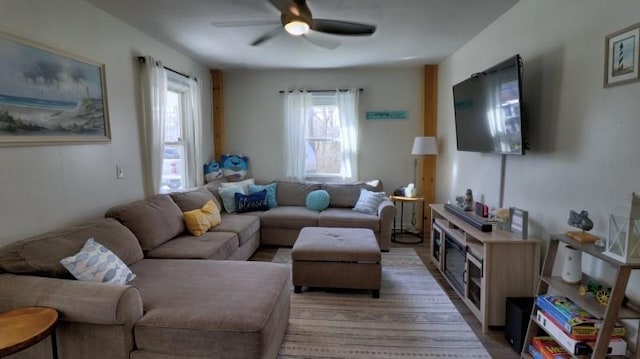 living room featuring a ceiling fan