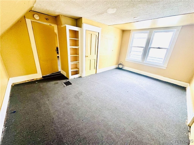 99 Roebling Ave, Buffalo, NY 14215 - empty room with a textured ceiling, baseboards, and carpet