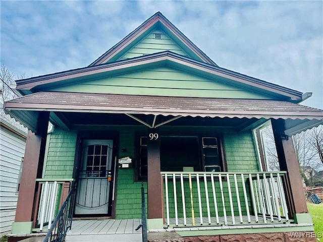 99 Roebling Ave, Buffalo, NY 14215 - view of front facade featuring covered porch