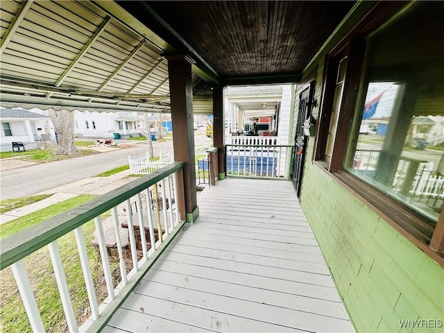 99 Roebling Ave, Buffalo, NY 14215 - wooden terrace with a residential view and a porch