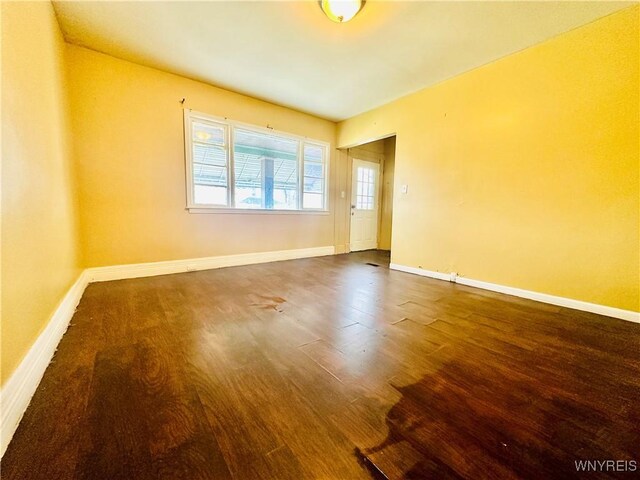 99 Roebling Ave, Buffalo, NY 14215 - empty room featuring baseboards and wood finished floors