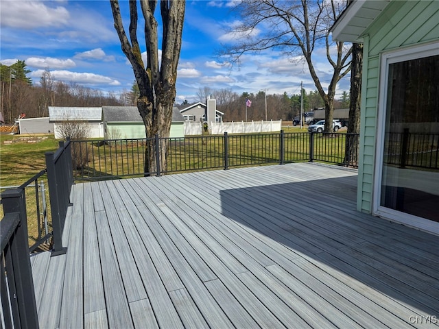 wooden deck with a yard