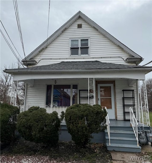 72 Person St, Buffalo, NY 14212 - bungalow-style house with roof with shingles and covered porch