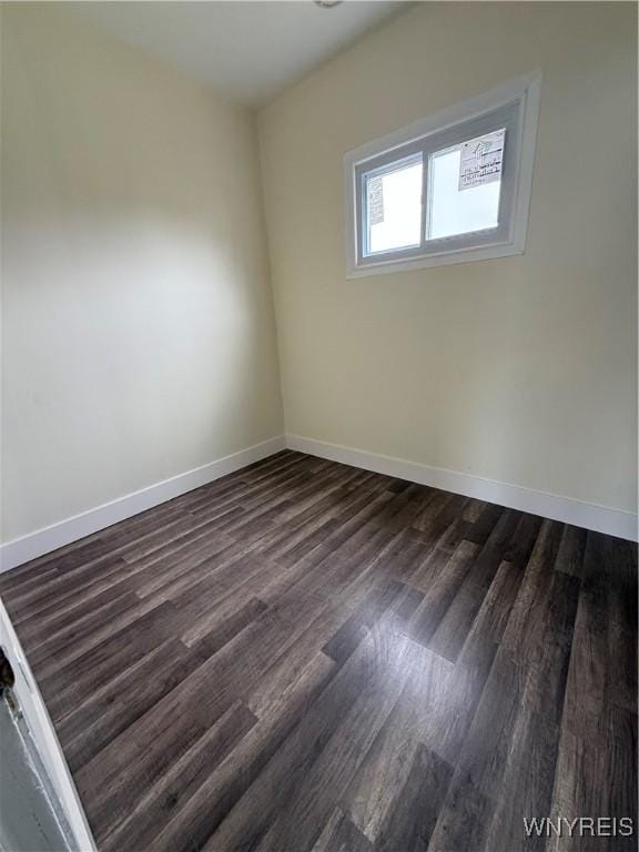 72 Person St, Buffalo, NY 14212 - empty room with dark wood-style flooring and baseboards