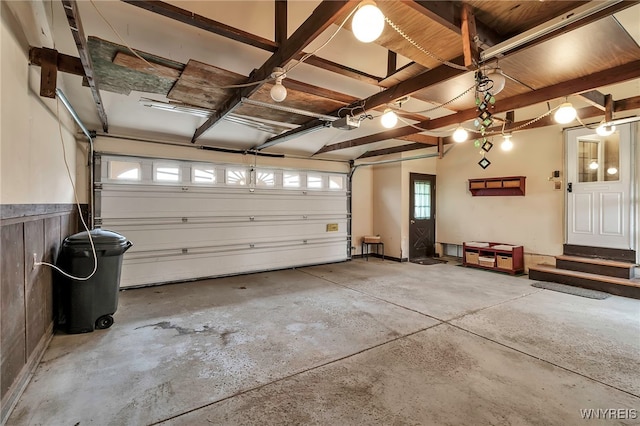 garage featuring a garage door opener