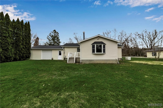 rear view of house with a lawn