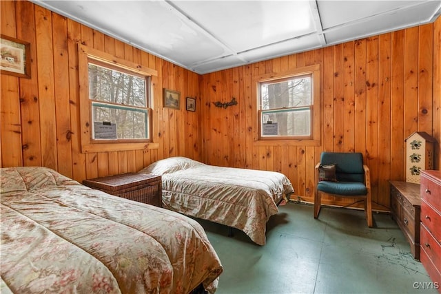 172 Green St, Ephratah, NY 13452 - bedroom with wood walls and concrete floors