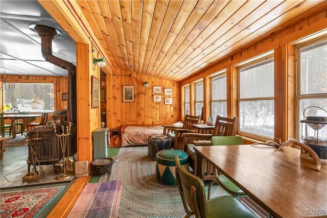 172 Green St, Ephratah, NY 13452 - living area with wooden ceiling, wood walls, lofted ceiling, and wood finished floors