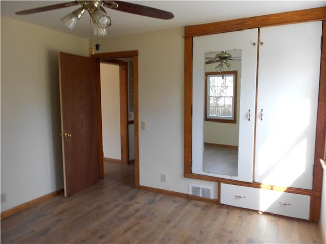 613 Hatfield St, Horseheads, NY 14845 - empty room with wood finished floors, baseboards, a ceiling fan, and visible vents
