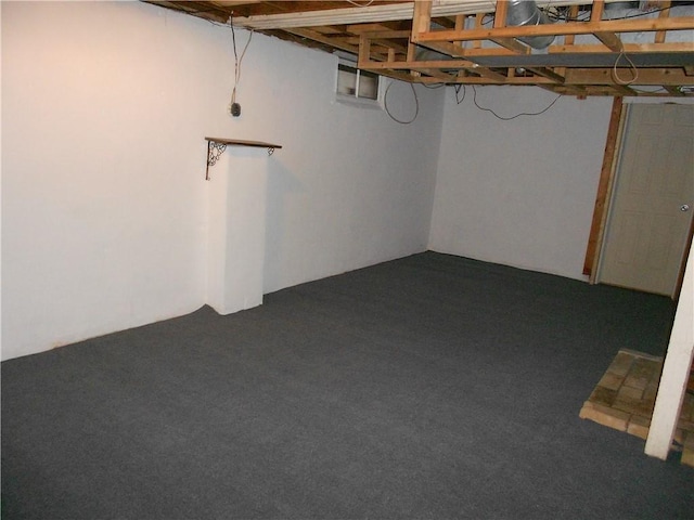 613 Hatfield St, Horseheads, NY 14845 - finished below grade area featuring dark carpet