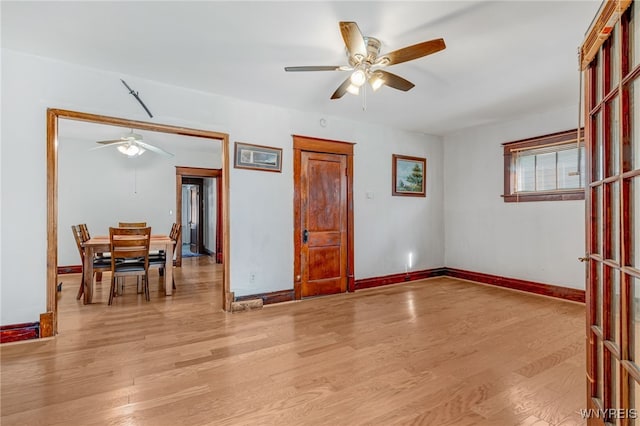 43 Freund St, Buffalo, NY 14211 - spare room featuring light wood finished floors, baseboards, and a ceiling fan