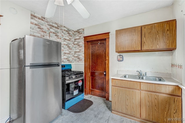 43 Freund St, Buffalo, NY 14211 - kitchen with ceiling fan, light countertops, a sink, and appliances with stainless steel finishes