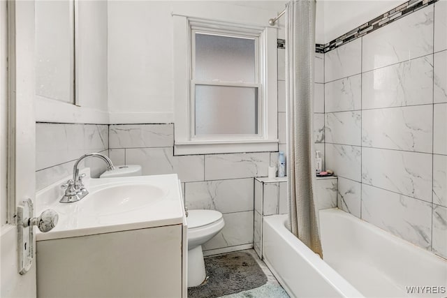 43 Freund St, Buffalo, NY 14211 - bathroom featuring toilet, vanity, shower / tub combo with curtain, and tile walls