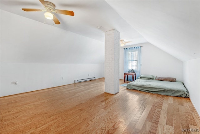43 Freund St, Buffalo, NY 14211 - bedroom featuring lofted ceiling, baseboard heating, ceiling fan, and wood finished floors
