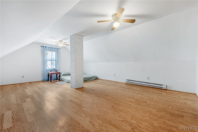 43 Freund St, Buffalo, NY 14211 - additional living space with a baseboard radiator, a ceiling fan, vaulted ceiling, and wood finished floors