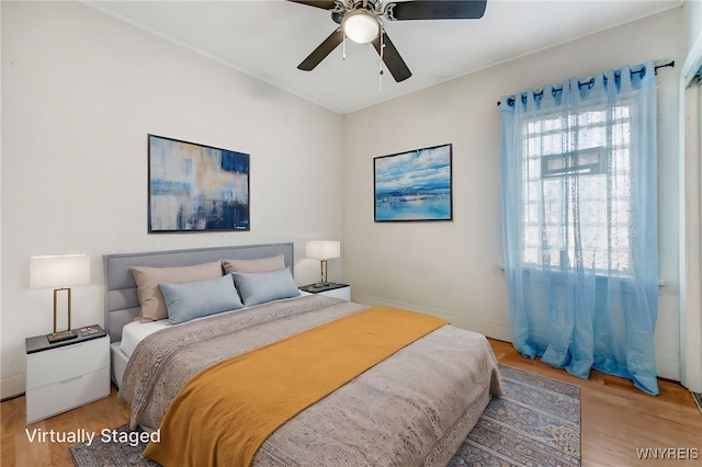 43 Freund St, Buffalo, NY 14211 - bedroom featuring light wood-style flooring, baseboards, and a ceiling fan