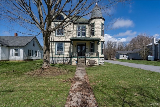 11853 State Route 12e, Lyme, NY 13622 - view of front of house featuring a front yard and a porch