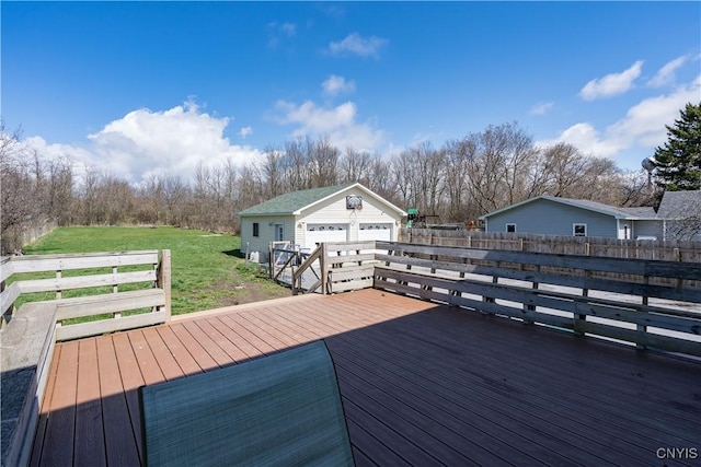 11853 State Route 12e, Lyme, NY 13622 - wooden terrace with a lawn, fence, an outbuilding, and a detached garage