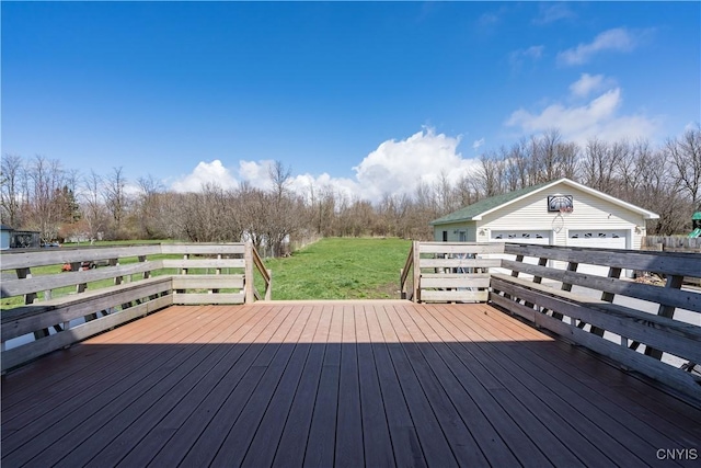 11853 State Route 12e, Lyme, NY 13622 - deck with a yard, a garage, and an outdoor structure