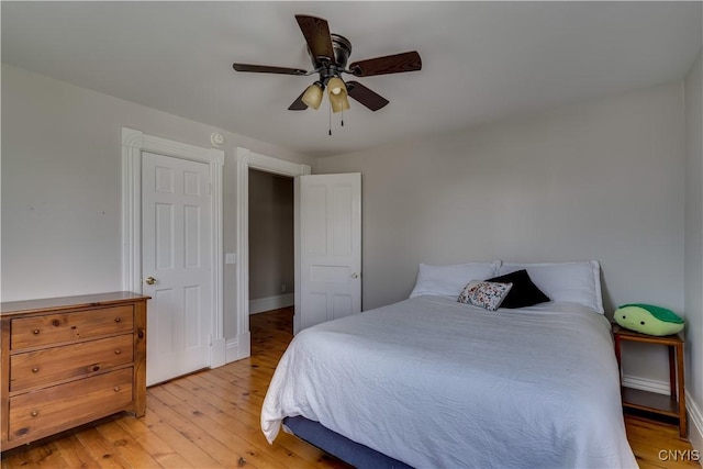 11853 State Route 12e, Lyme, NY 13622 - bedroom featuring ceiling fan, light wood-type flooring, and baseboards