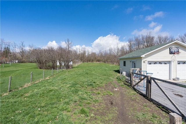 11853 State Route 12e, Lyme, NY 13622 - view of yard with an outbuilding, fence, and a detached garage