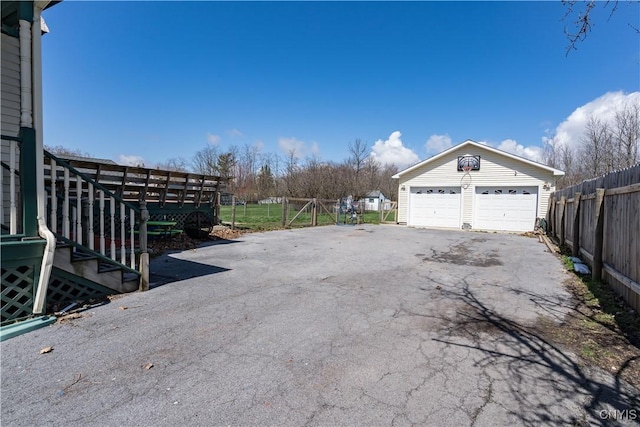 11853 State Route 12e, Lyme, NY 13622 - view of yard with an outbuilding, a garage, and fence