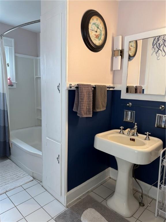 11 Cedar St, Oneonta-City, NY 13820 - bathroom featuring tile patterned floors, shower / tub combo, baseboards, and a sink