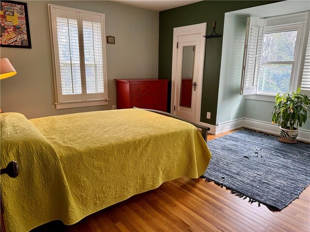 11 Cedar St, Oneonta-City, NY 13820 - bedroom with baseboards and wood finished floors