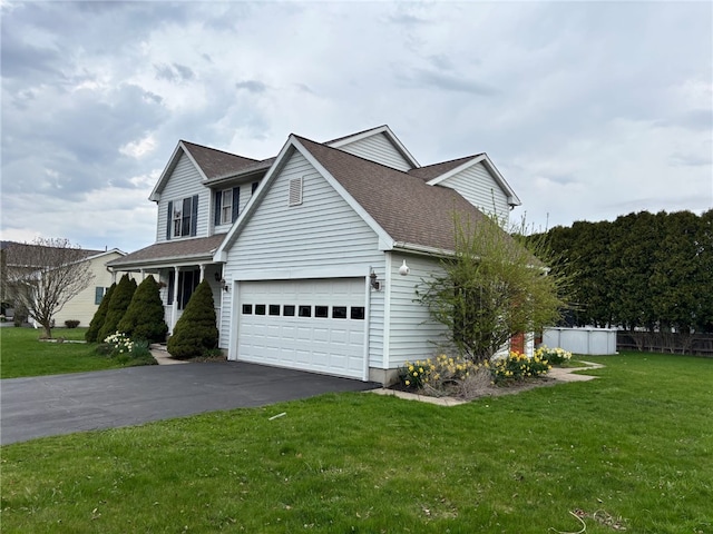 6 Tara Pl, Erwin, NY 14870 - view of home's exterior featuring asphalt driveway, roof with shingles, and a garage