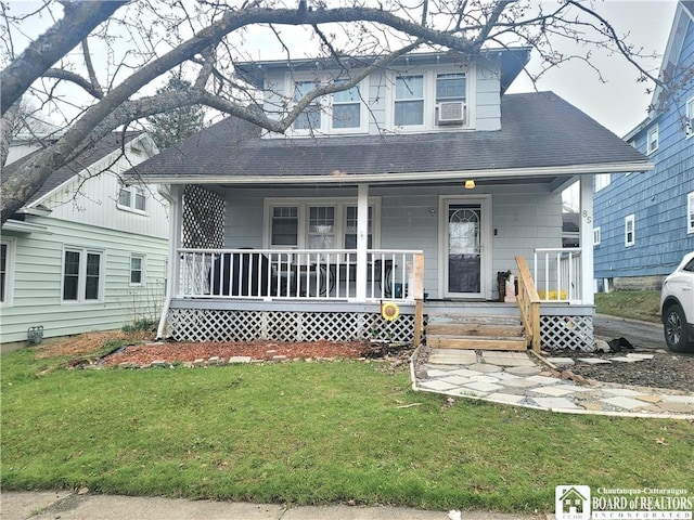 85 Dearborn St, Jamestown, NY 14701 - bungalow-style home with a front yard, a porch, and a shingled roof