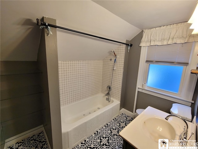 85 Dearborn St, Jamestown, NY 14701 - full bath featuring baseboards, vaulted ceiling, tile patterned floors, shower / tub combination, and a sink